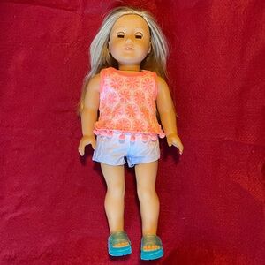 American girl doll, blonde, gray-green eyes